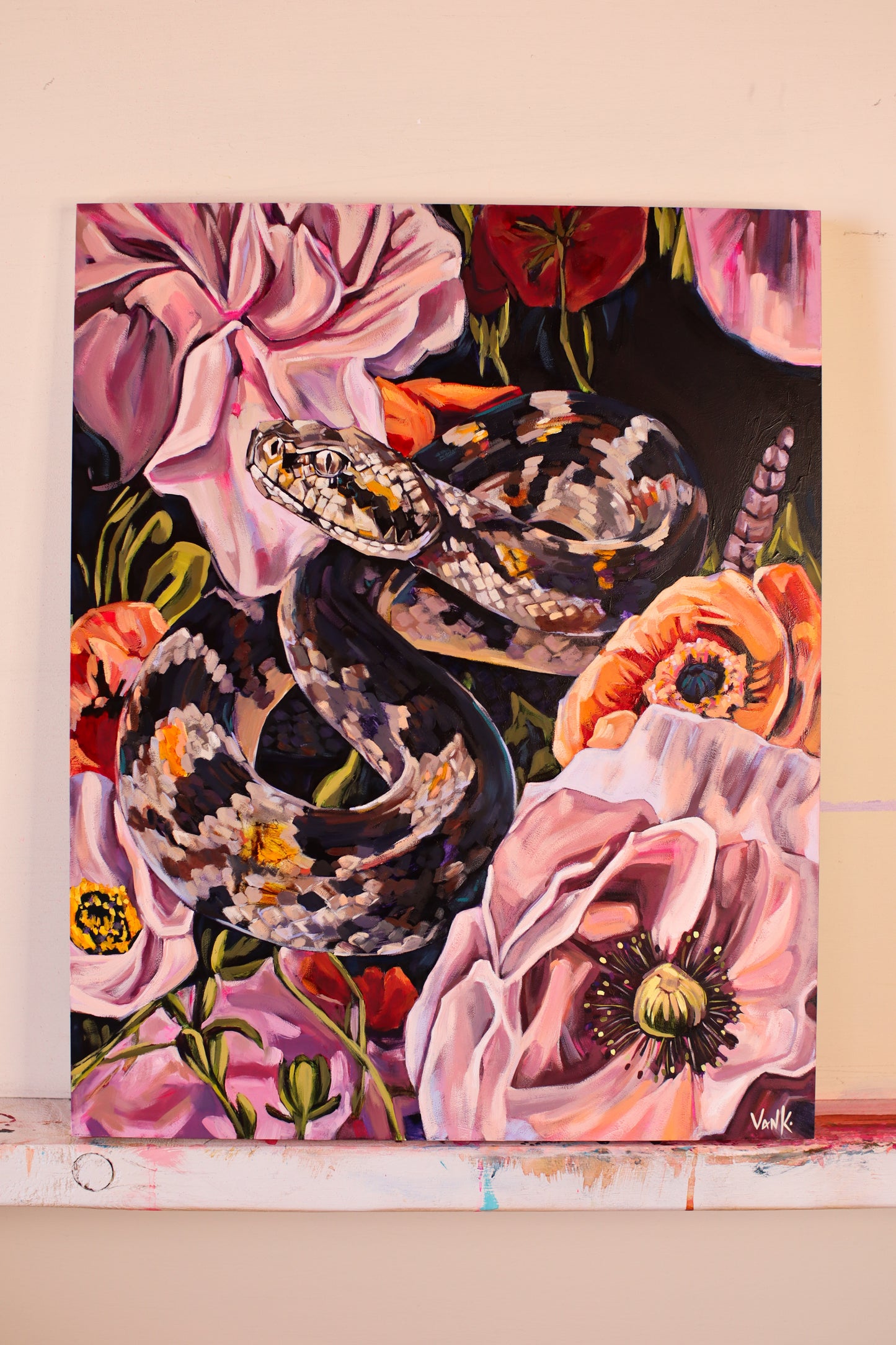 "the serpent wears a crown made of flowers"