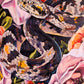 "the serpent wears a crown made of flowers"