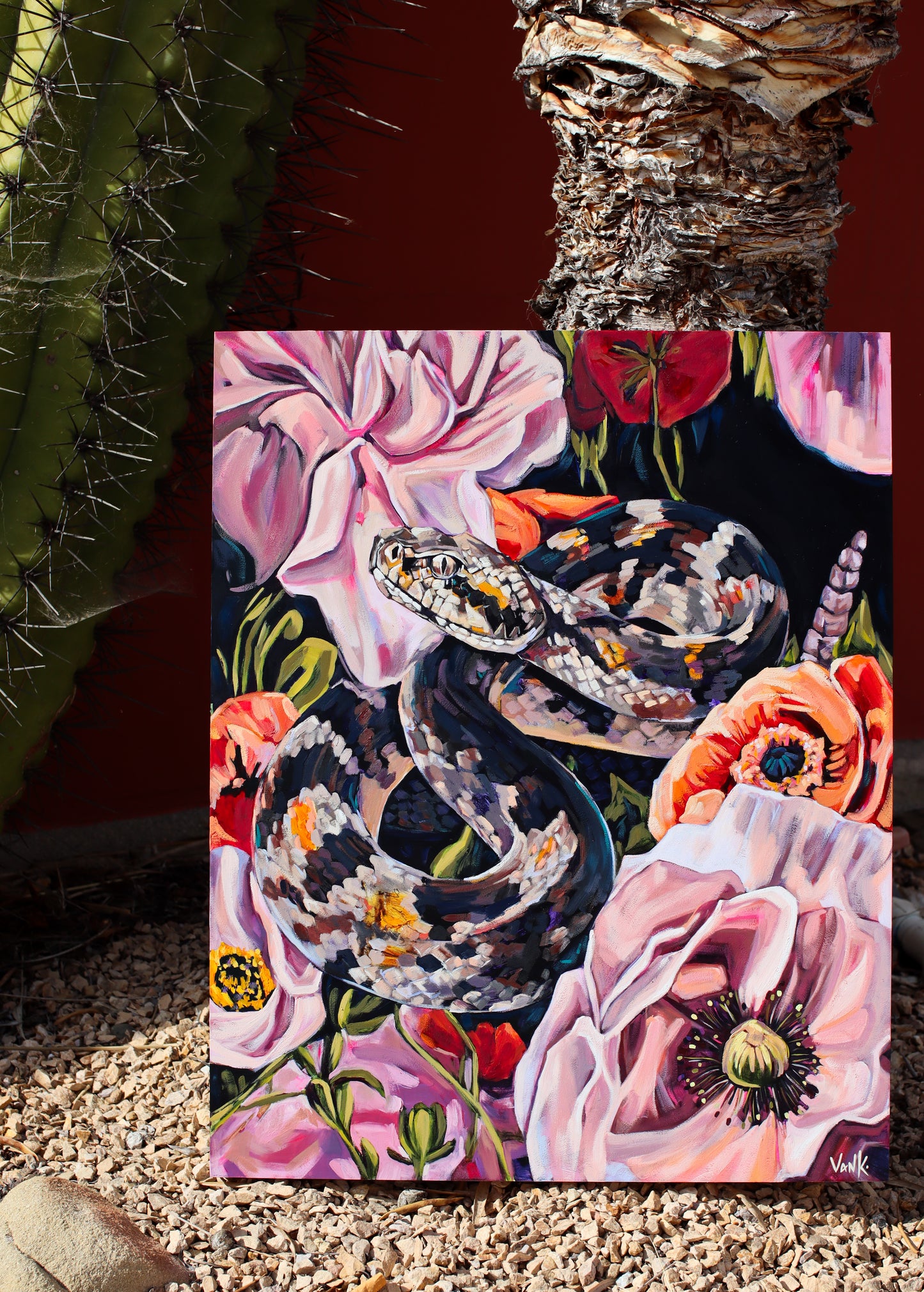 "the serpent wears a crown made of flowers"