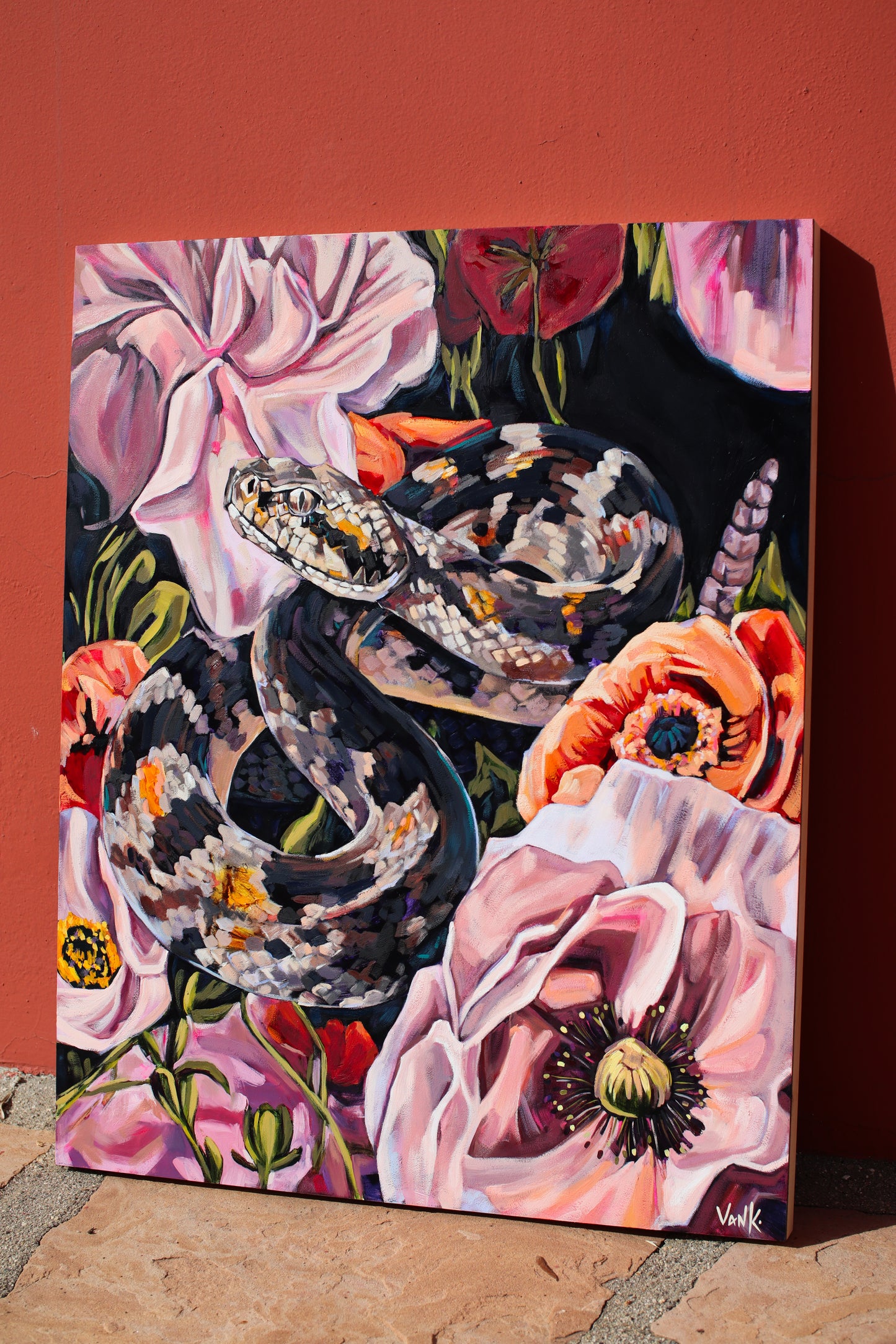 "the serpent wears a crown made of flowers"